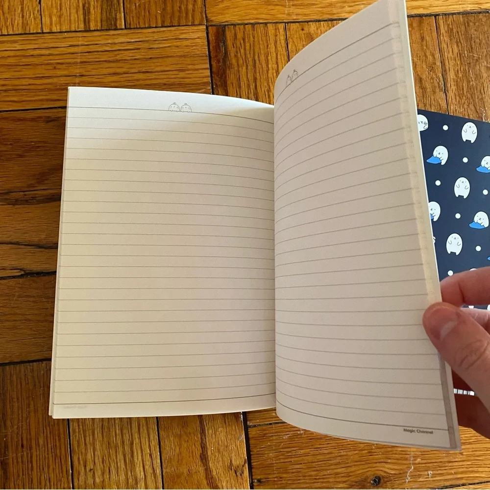 Two Thin Seal Print Notebooks